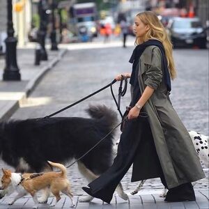 Fully lined Vintage Burberry Trench Coat.